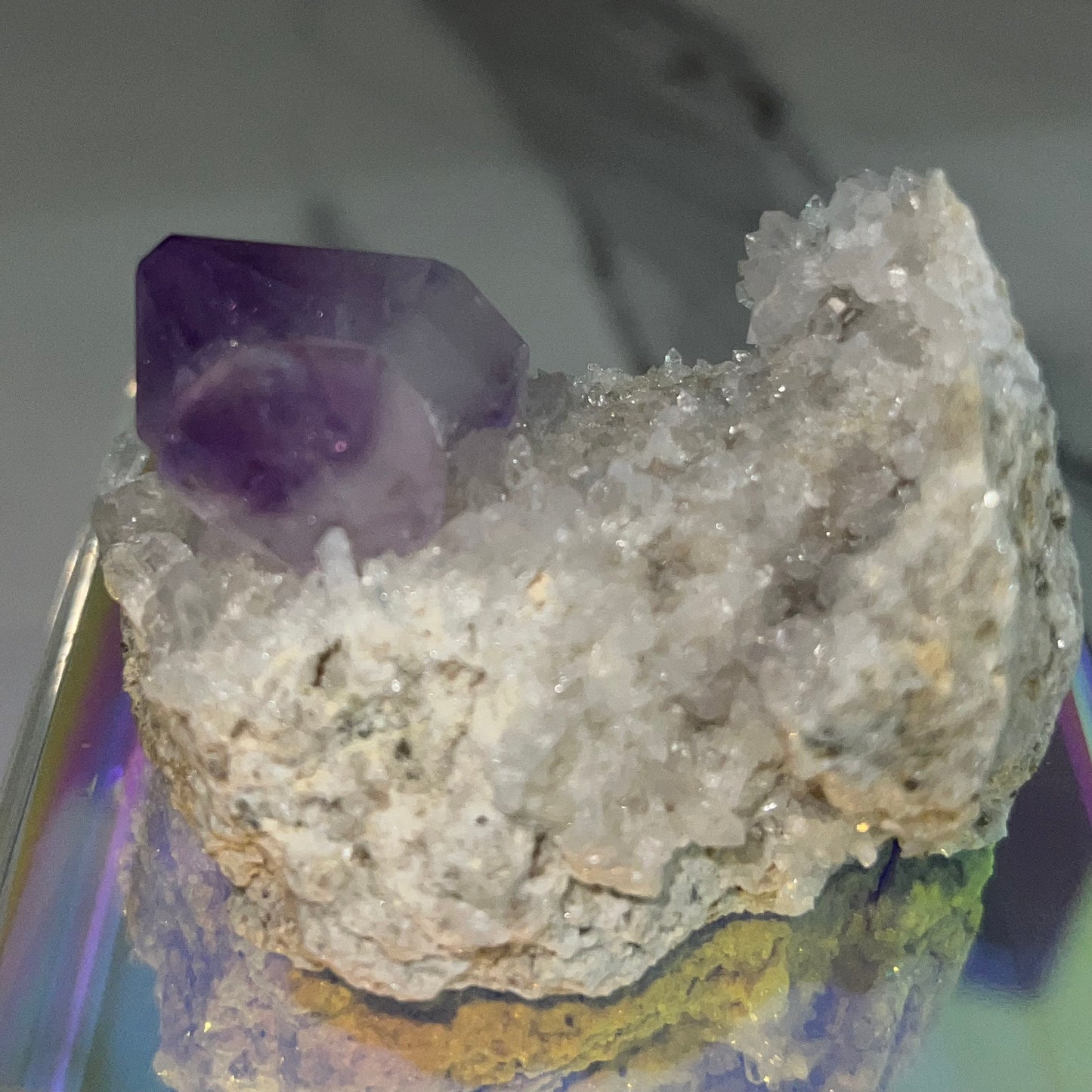 Amethyst crystal and quartz on a white background